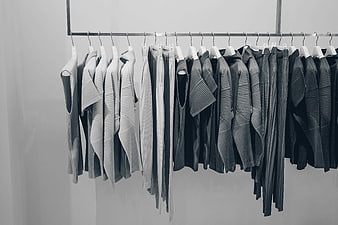 Minimalist black and white clothing rack in fashion store