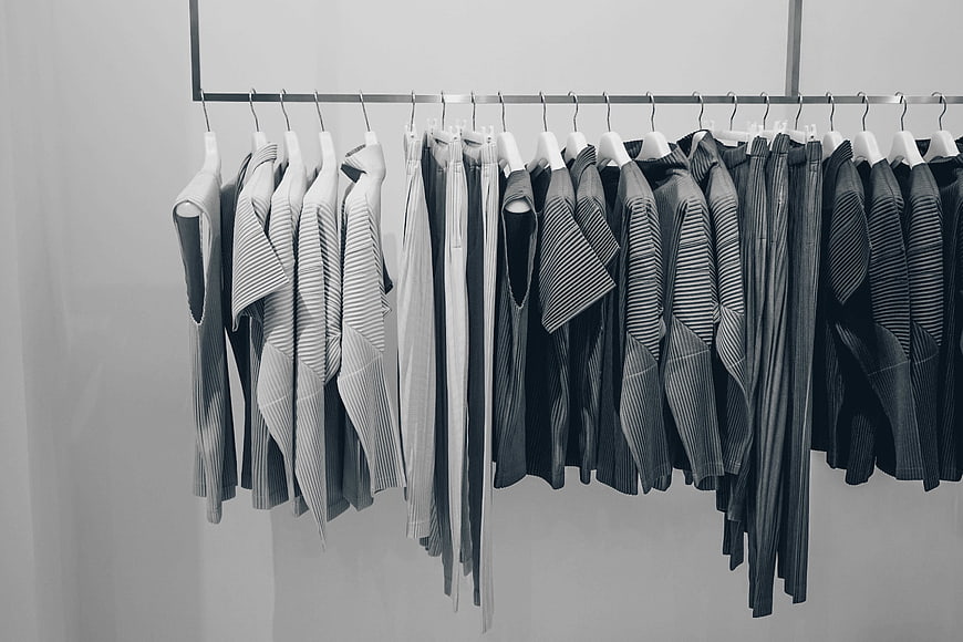 Minimalist black and white clothing rack in fashion store