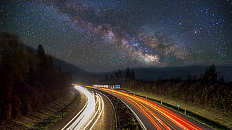 Milky Way Galaxy Over Highway with Long Exposure Light Trails