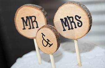 Rustic Mr and Mrs Wooden Cake Topper on White Wedding Cake