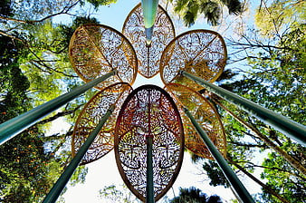 Low Angle View of Decorative Metal Flower Sculpture in Park