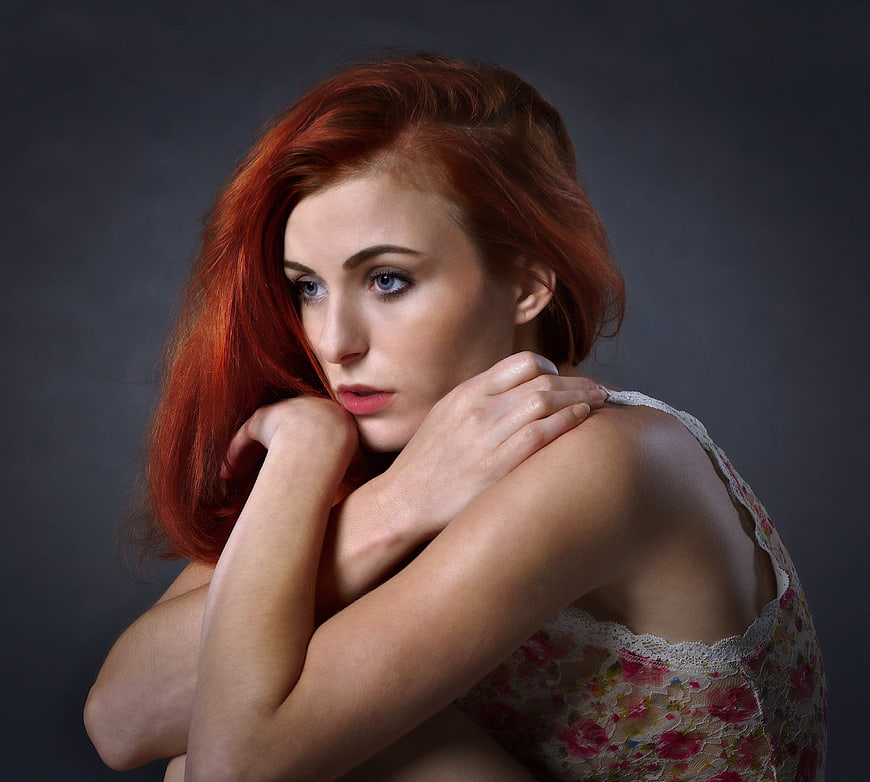 Melancholic Portrait of Young Woman With Red Hair