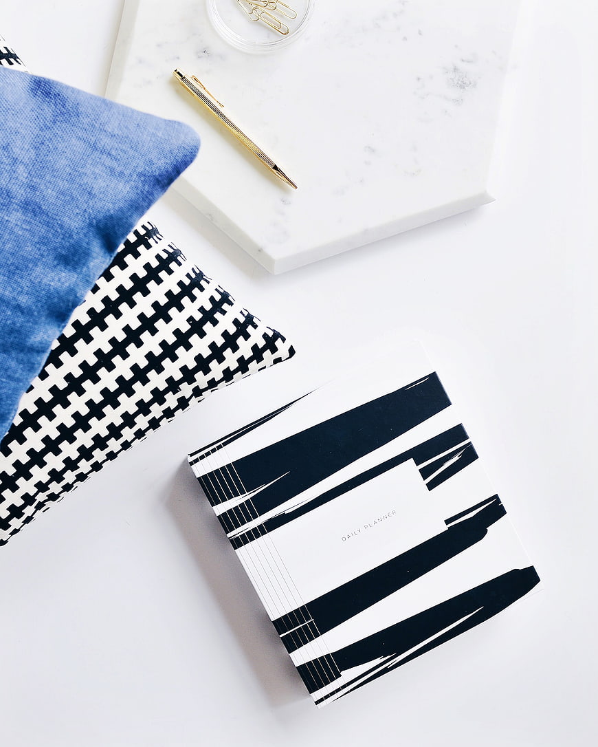 Minimalist Workspace Flat Lay with Planner and Marble