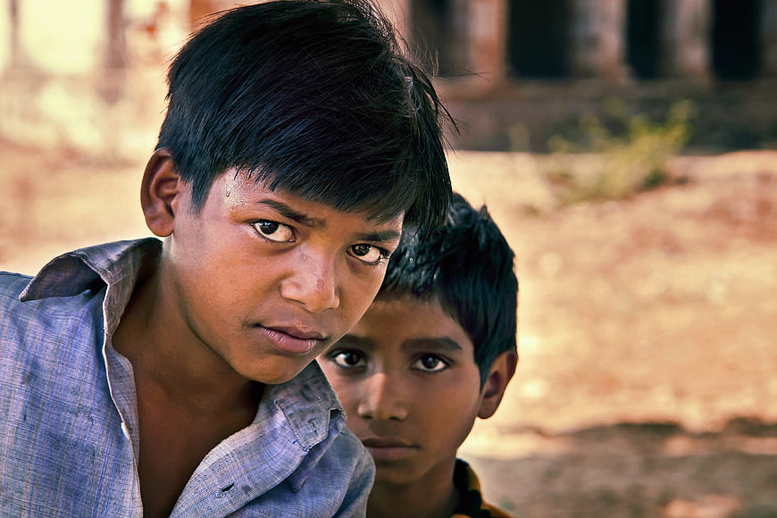 Portrait of Two Young Indian Boys Looking at Camera
