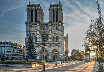Notre Dame Cathedral Paris Facade With Christmas Tree And Morning Light