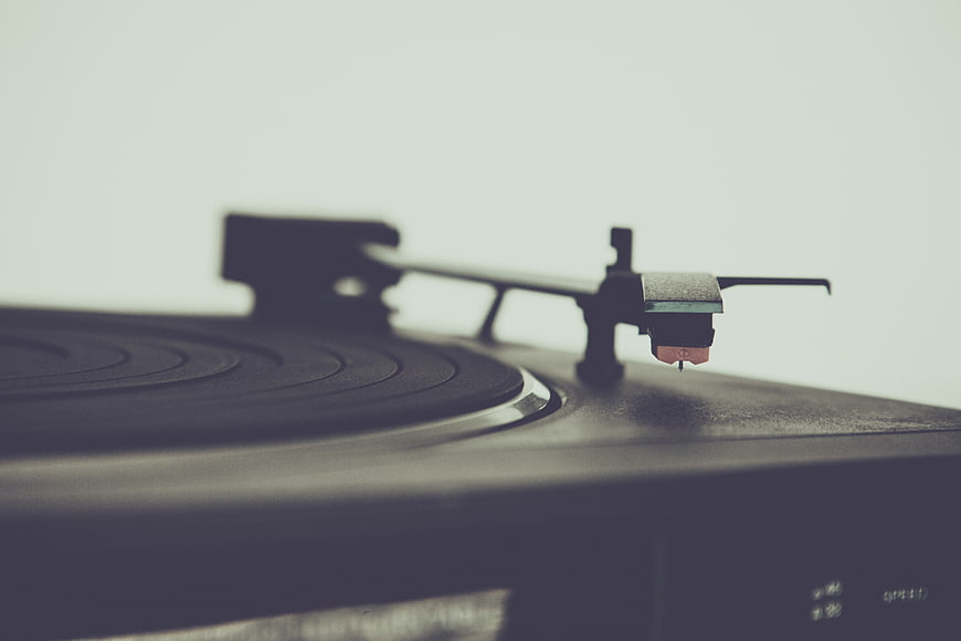 Close-up of vinyl record player tonearm and needle
