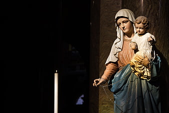 Statue of Virgin Mary and Child with Rosary and Candle