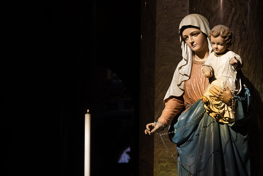 Statue of Virgin Mary and Child with Rosary and Candle