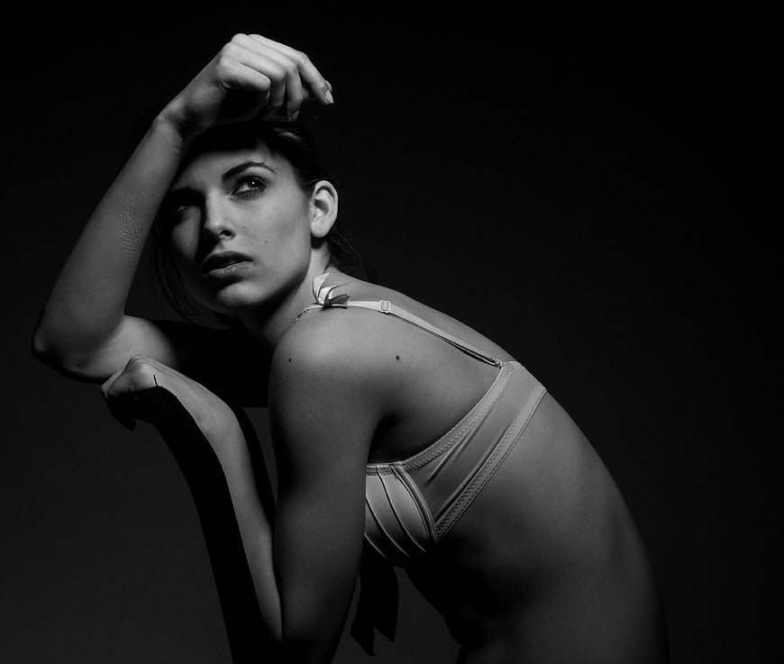 Dramatic Black and White Portrait of Woman in Lingerie