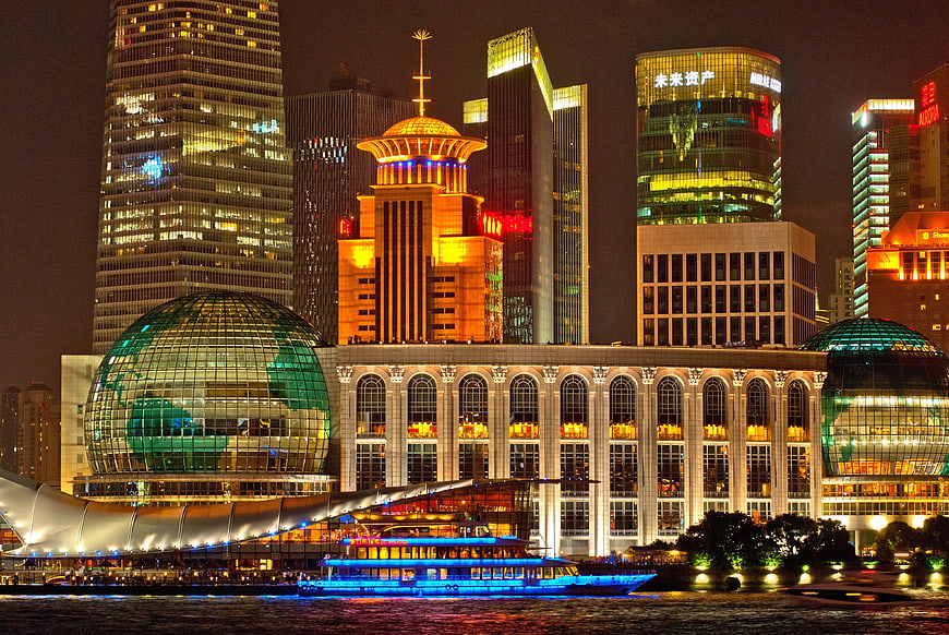 Shanghai Bund Night Skyline with Illuminated Buildings and River Cruise