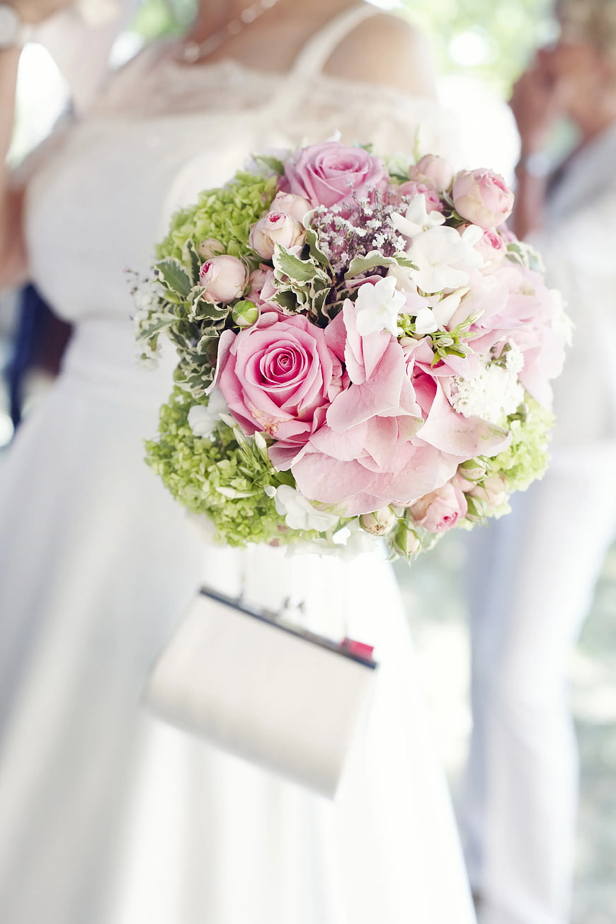 Bridal bouquet with pink roses and green hydrangeas