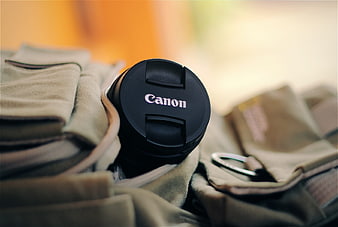 Canon Camera Lens Cap in Khaki Bag
