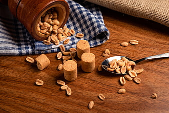 Brazilian Peanut Candy and Peanuts on Wooden Table