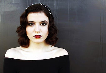 Vintage Style Woman Portrait with Dark Makeup and Headband