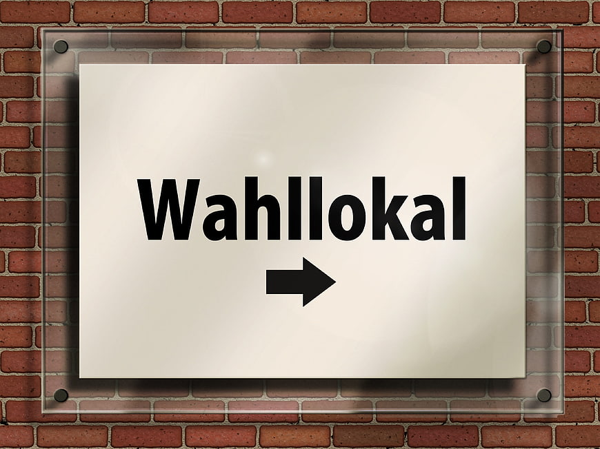 German Wahllokal Polling Station Sign on Brick Wall