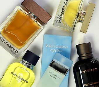 Collection of Dolce and Gabbana men's perfumes on white background