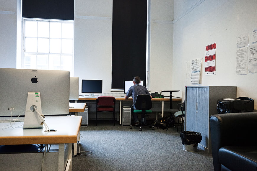 Student Working On Computer In University Computer Lab