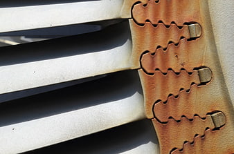 Close-up of turbine blade locking mechanism with dovetail attachment