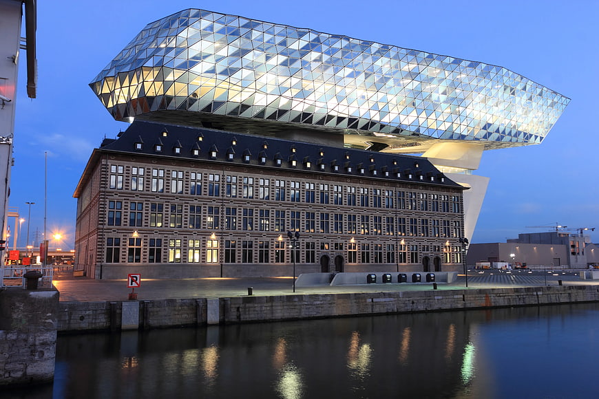 Modern Glass Architecture on Historic Building at Dusk
