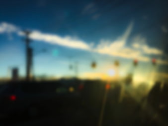 Abstract Blurred Sunset Sky with Bokeh Lights