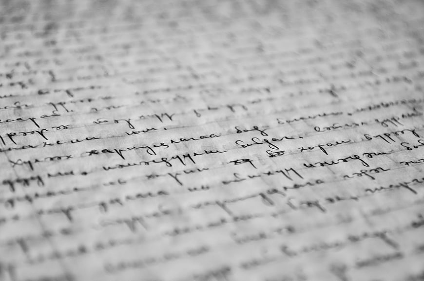 Close-up of vintage handwritten cursive text on paper