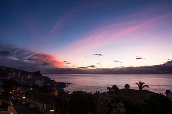 Coastal Town Sunset with Pink and Purple Sky
