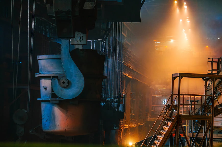 Industrial Steel Factory Interior with Molten Metal and Crane