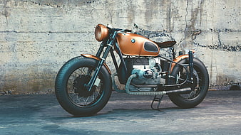 Custom Vintage BMW Motorcycle Against Concrete Wall