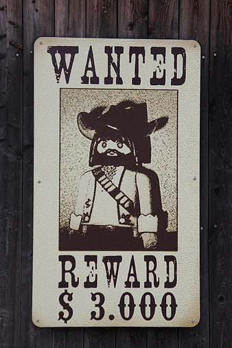 Vintage Wanted Poster with Toy Cowboy Figure