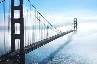 Golden Gate Bridge Rising Above Thick Fog in San Francisco