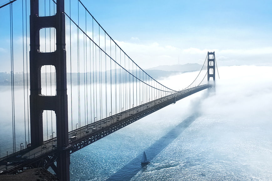 Golden Gate Bridge Rising Above Thick Fog in San Francisco