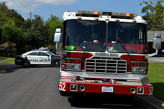 Almeda Hall Fire Engine 52 and Houston Police Car on Residential Street