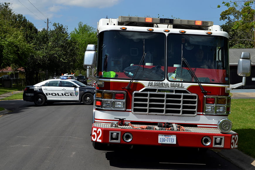 Almeda Hall Fire Engine 52 and Houston Police Car on Residential Street