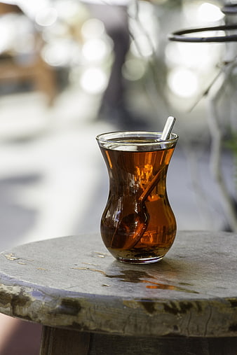 Traditional Turkish Tea Glass on Wooden Table