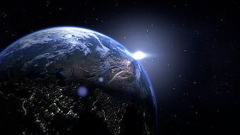 Earth from Space with City Lights and Sun Flare