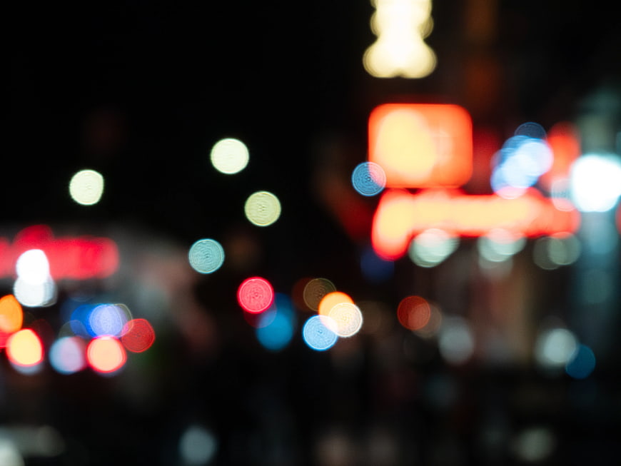 Abstract Bokeh Background of Blurred Night City Lights