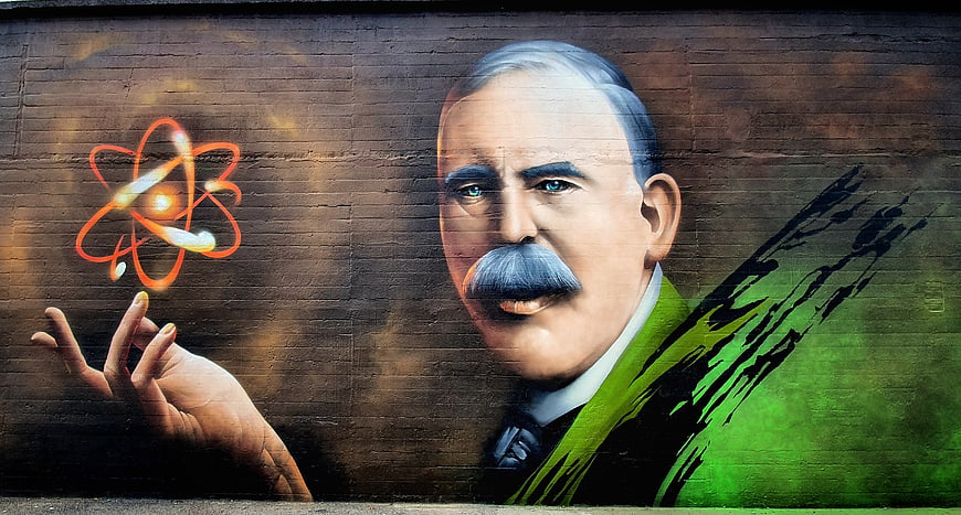 Street Art Mural of Ernest Rutherford with Atom Symbol