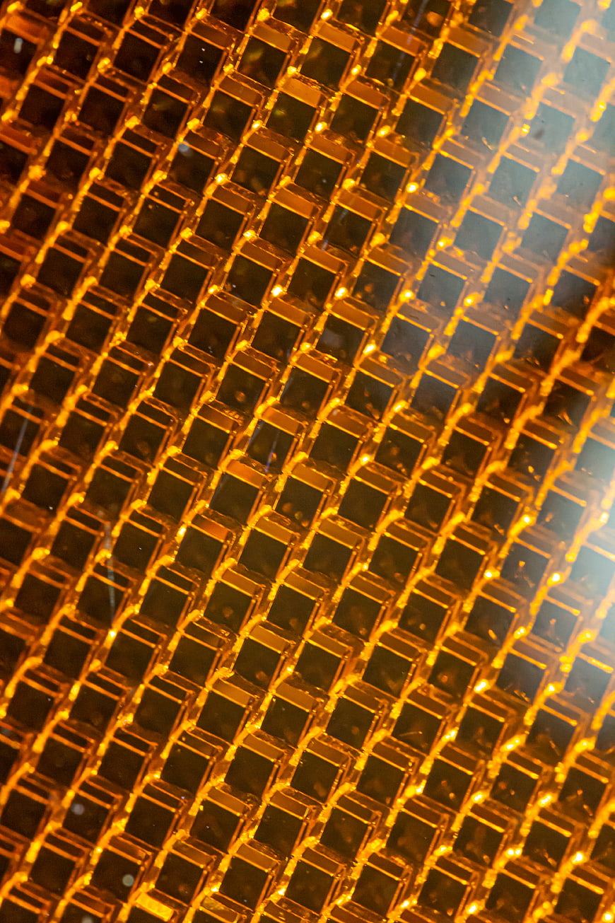 Abstract Glowing Amber Cube Grid Pattern