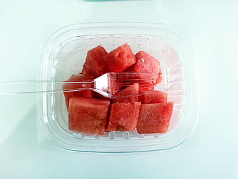 Top View of Cubed Watermelon in Clear Plastic Container