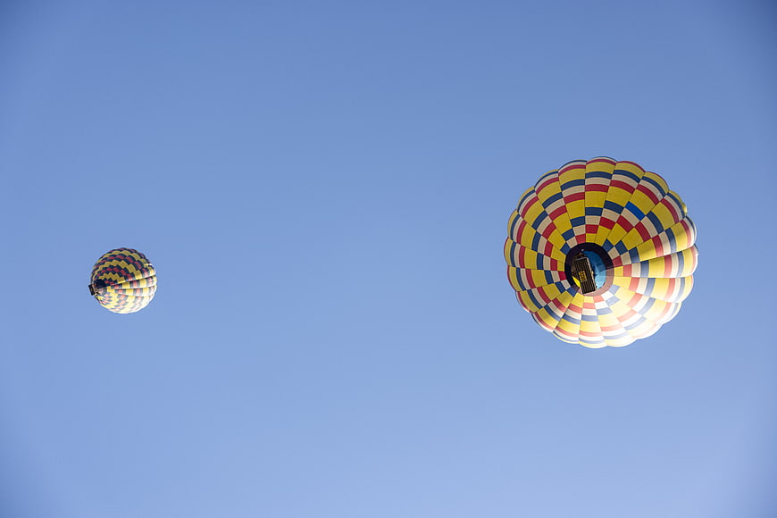 Colorful Hot Air Balloons Flying in Blue Sky