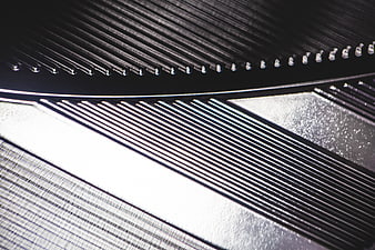 Abstract metallic texture with diagonal lines and rivets