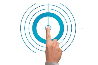Hand pointing at blue target concept on white background