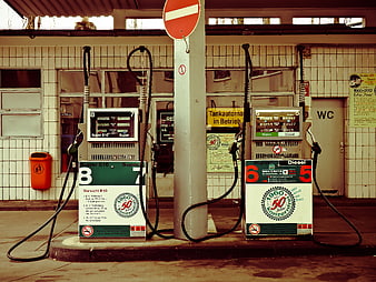 Vintage German Gas Station Pumps With Retro Fuel Nozzles