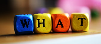 Colorful Wooden Blocks Spelling What on Table