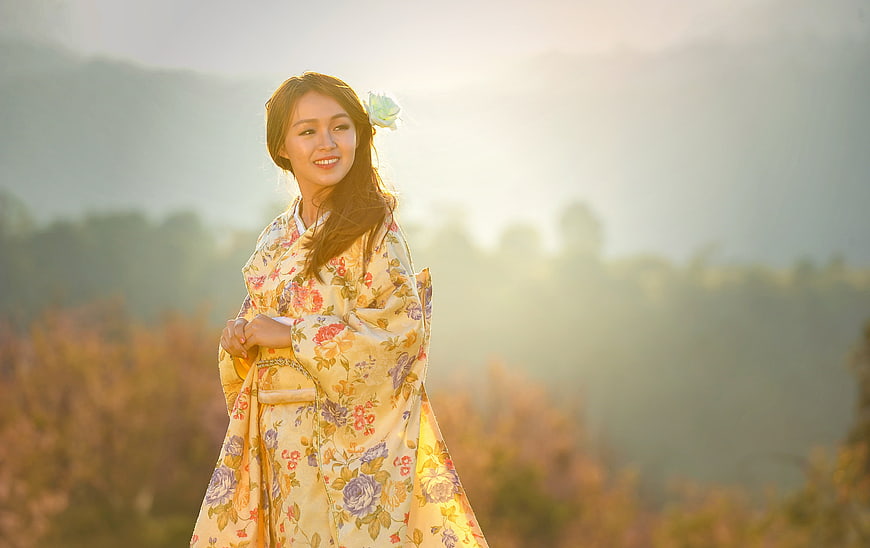 Asian Woman in Floral Hanbok Portrait at Sunset