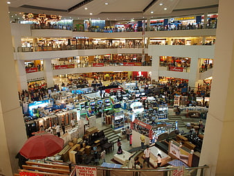 High angle view of busy multi-level shopping mall interior