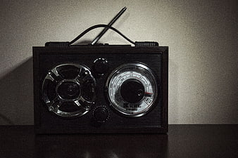 Vintage Retro Radio on Dark Wooden Table