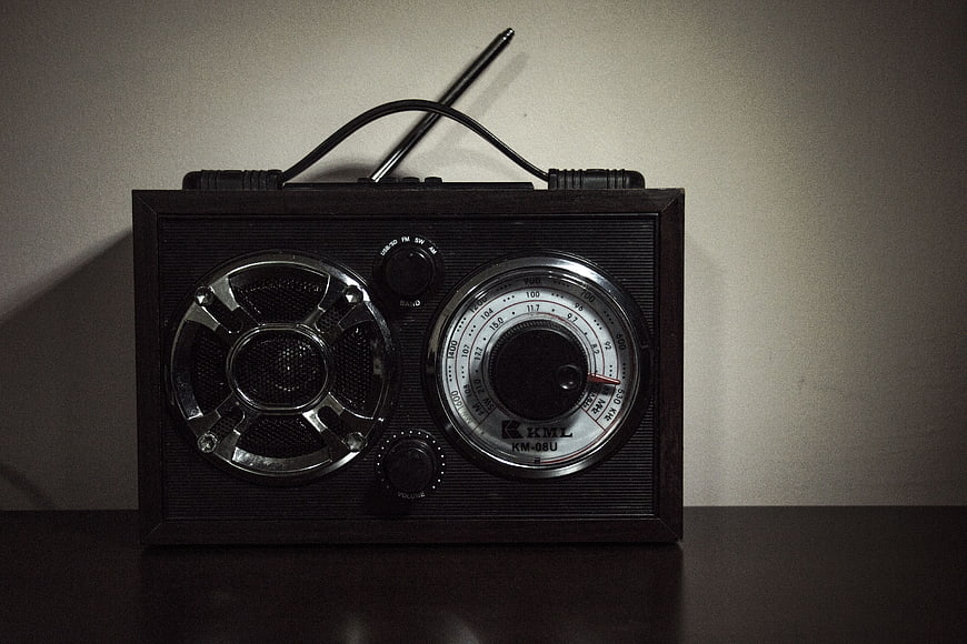 Vintage Retro Radio on Dark Wooden Table