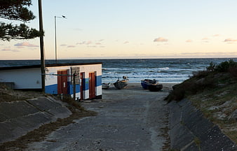 Coastal Path to Beach with Fishing Boats and Changing Rooms