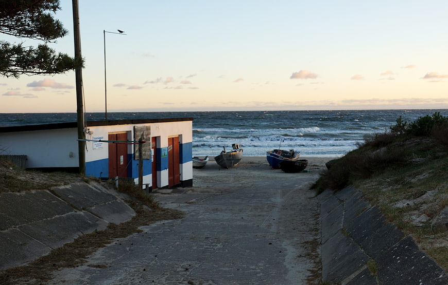 Coastal Path to Beach with Fishing Boats and Changing Rooms
